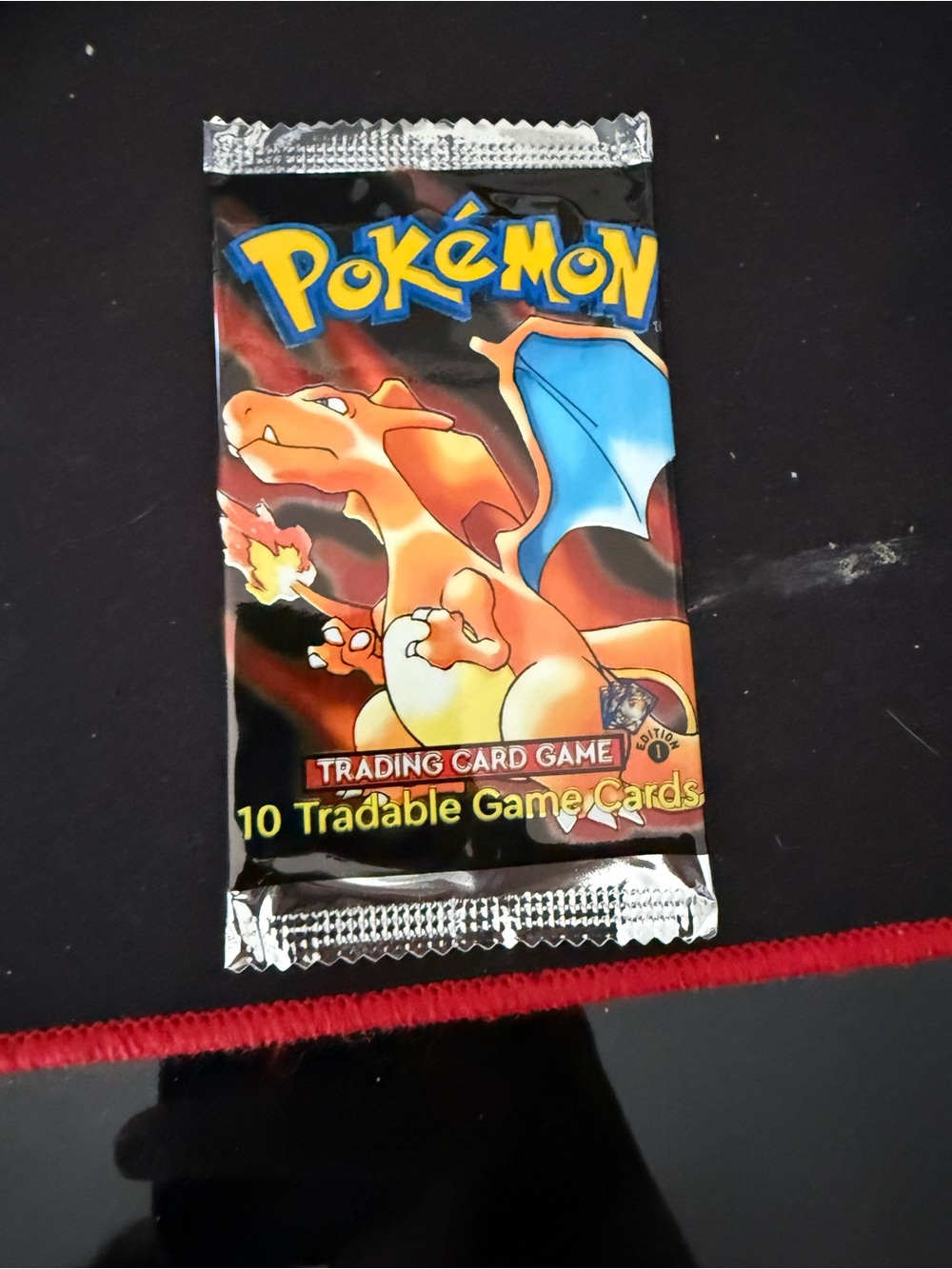 1:1 Base Set Pokemon Booster Pack - Charizard Artwork, Black/Orange 30 total.